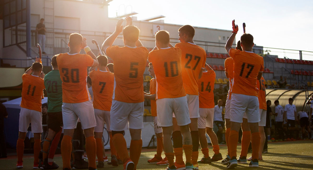 Payam Ravanfar leading a soccer team huddle in Novato, California, showcasing teamwork